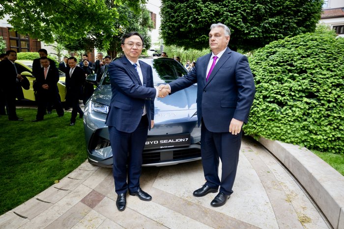 \u200bBYD Chairman Wang Chuanfu with Prime Minister of Hungary Viktor Orb\u00e1n in front of a BYD Sealion 7
