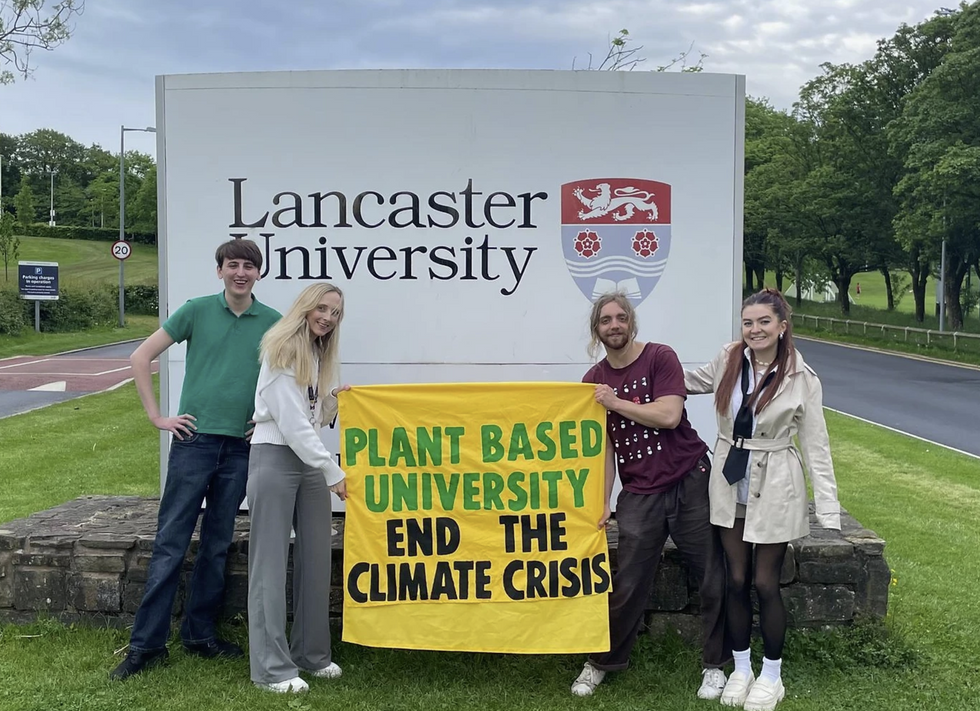 \u200bCampaigners celebrating the motion passing at the university