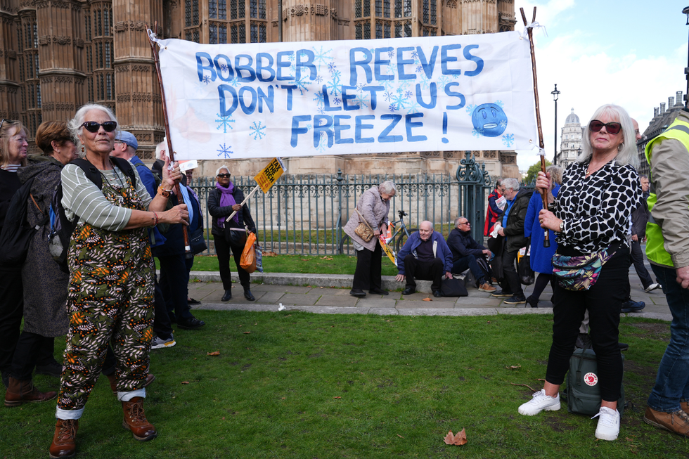 \u200bCampaigners take part in a protest against the Government's decision to scrap the winter fuel allowance for pensioners