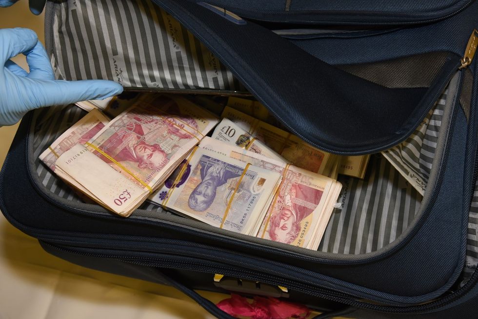 \u200bCash bundles in bag at lockup