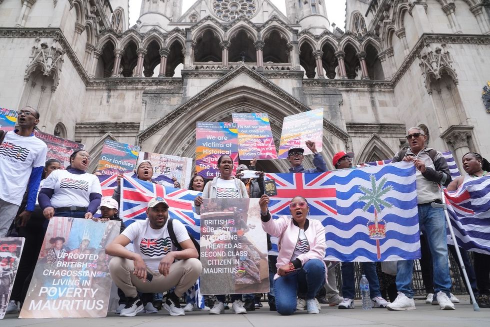 \u200bChagossians outside the High Court in central London