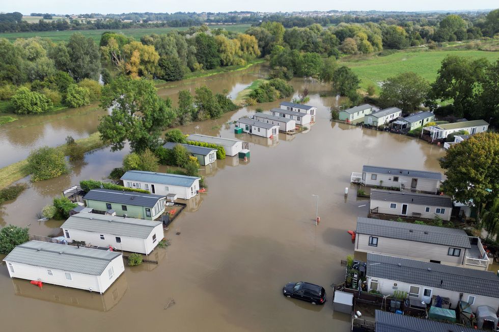 \u200bCogenhoe Mill Holiday Park in Northamptonshire submerged by floodwater after the River Nene burst its banks