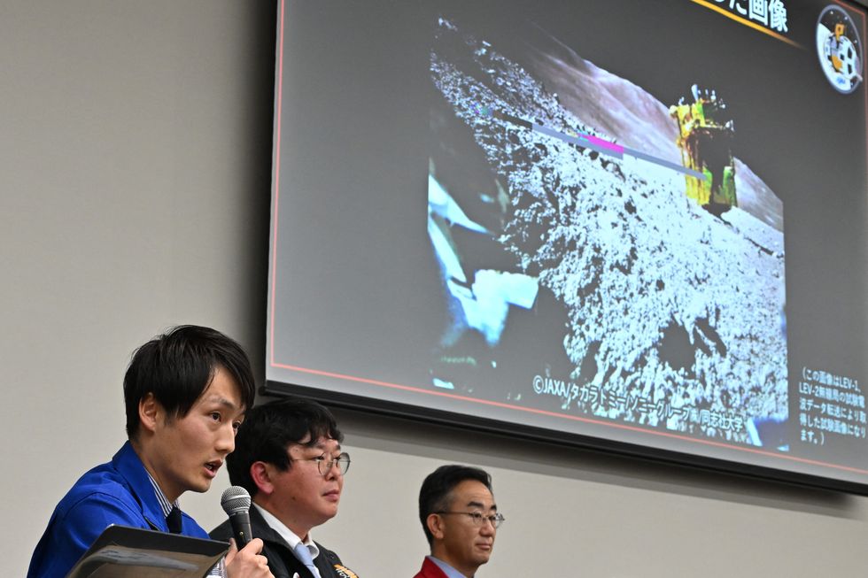 \u200bDaichi Hirnao (L), associate senior researcher at JAXA's Space Exploration Innovation Hub Center speaking about SLIM