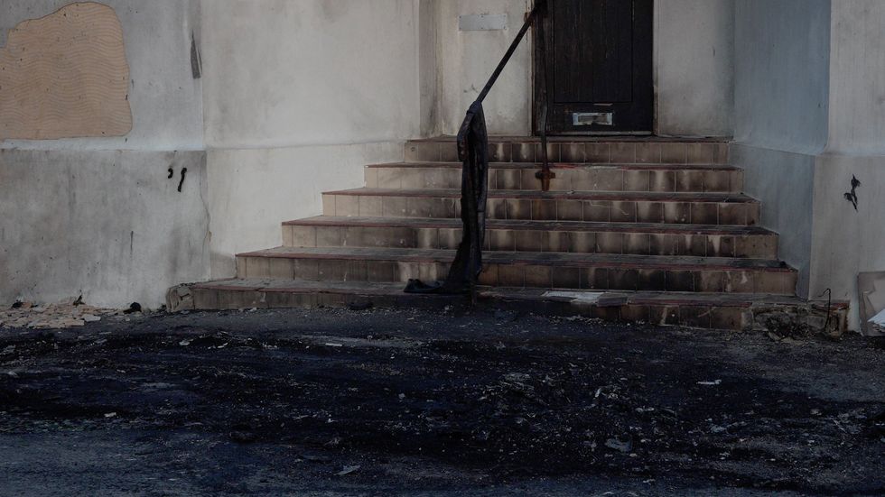 \u200bDamage outside the front entrance of the mosque in Phyllis Avenue, Peacehaven