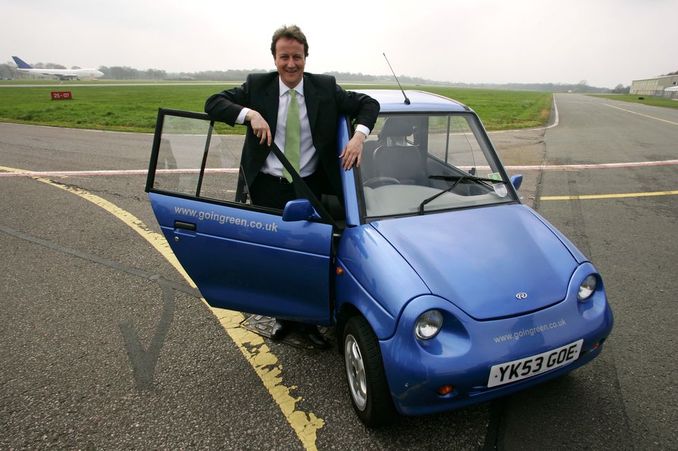 \u200bDavid Cameron with a Reva G-Wiz EV