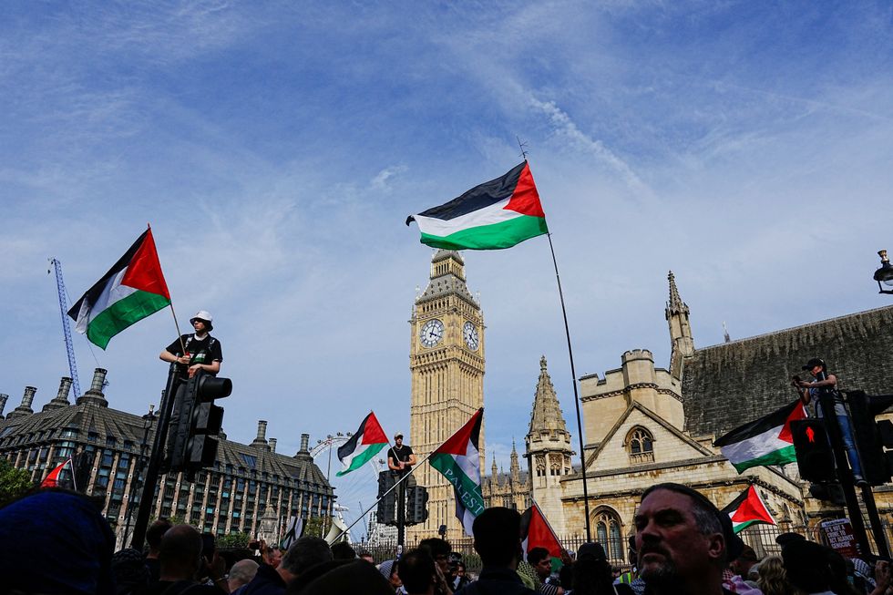 \u200bDemonstrators attend the "Lift The Ban" rally organised by Defend Our Juries,