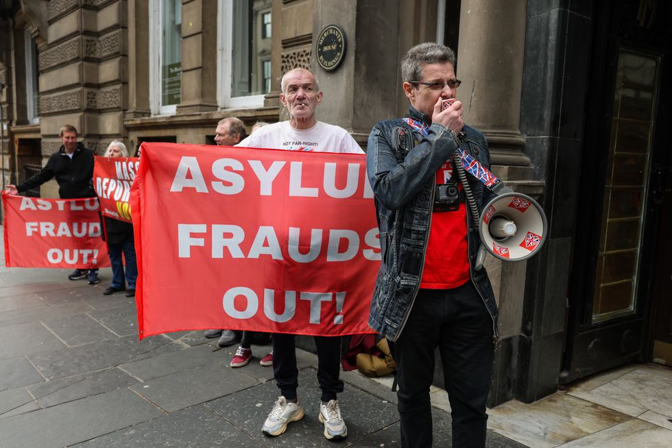 \u200bDemonstrators from A Force For Good demanding mass deportations