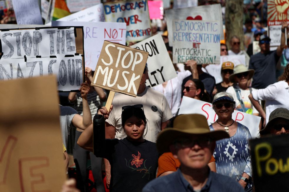 \u200bDemonstrators rally against U.S. President Donald Trump and his adviser Elon Musk