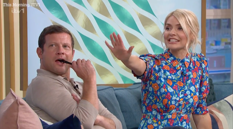 \u200bDermot O\u2019Leary sat awkwardly with a pen in his mouth while Willoughby laughed beside him