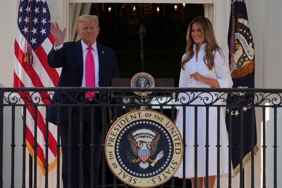 \u200bDonald and Melania Trump appearing at the White House