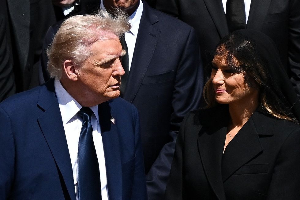 \u200bDonald Trump and first lady Melania Trump attend the funeral Mass of Pope Francis