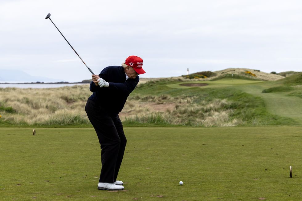 u200bDonald Trump playing golf