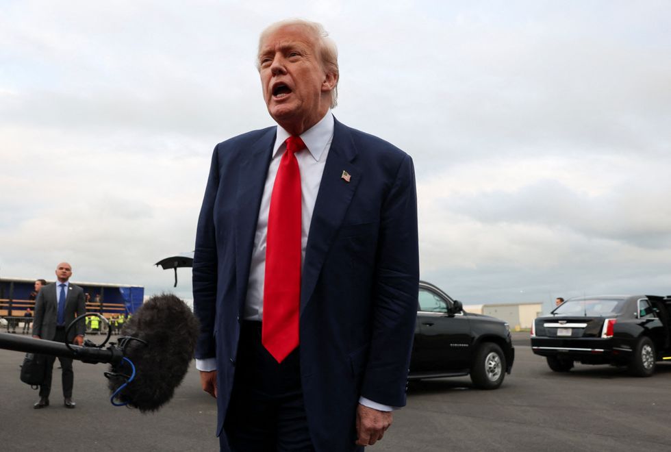 \u200bDonald Trump speaks to members of the media on his arrival at Glasgow Prestwick Airport