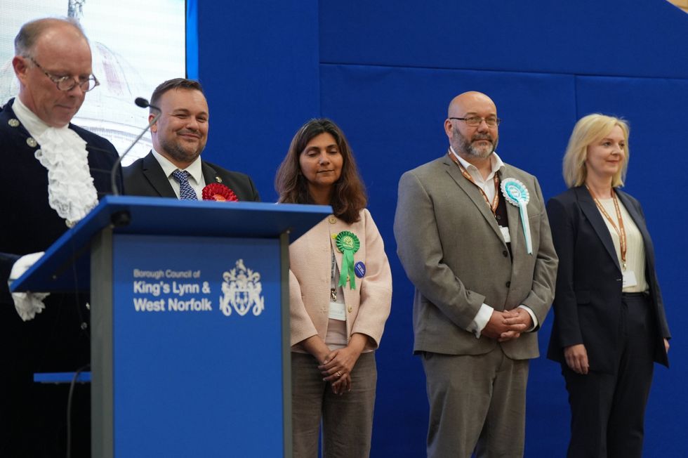 \u200bDr Devulapalli alongside Terry Jermy and Liz Truss