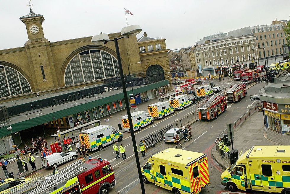 \u200bEmergency services are seen outside the main line station at Kings Cross on July 7, 2005