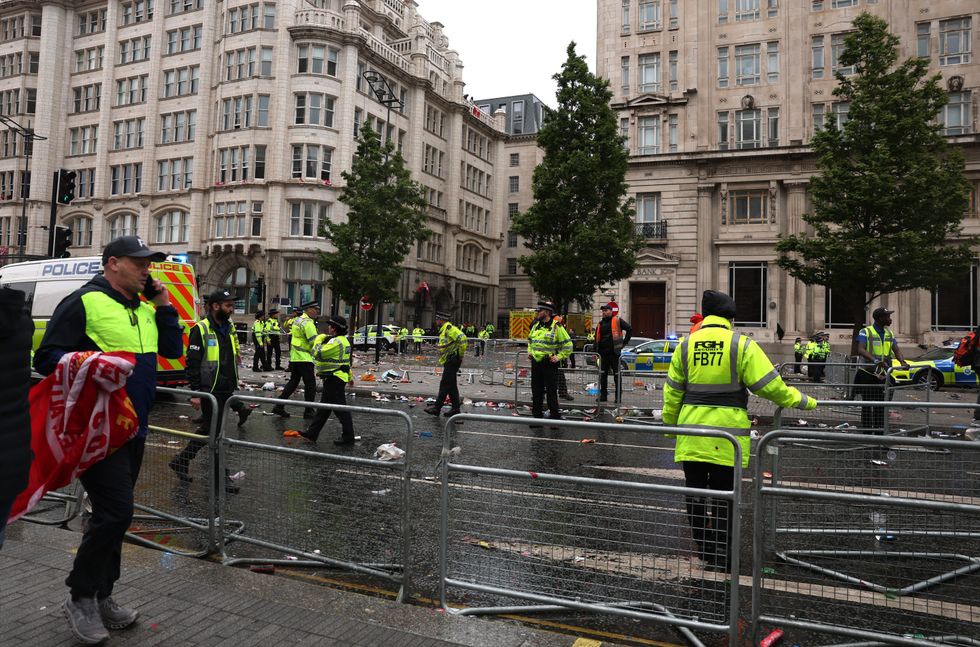 \u200bEmergency services at the scene after multiple people were hit by a car during the Victory parade