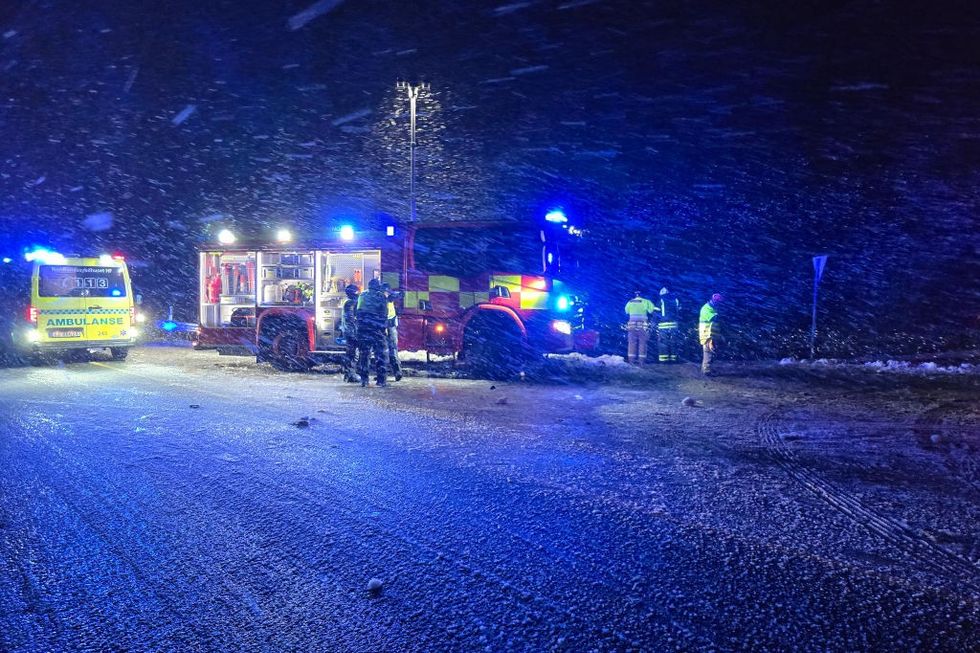 \u200bEmergency Services attend near the scene of an overturned bus after it left the road in an accident which killed three people, near Hadsel