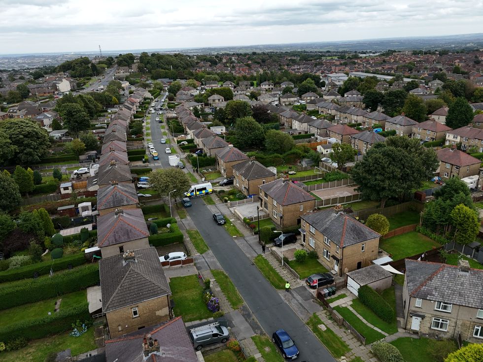\u200bEmergency services in Westbury Road, Bradford, following a house fire