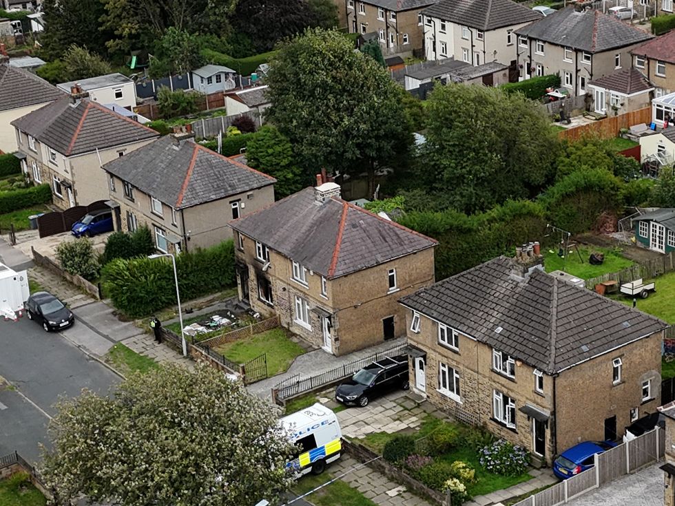 \u200bEmergency services in Westbury Road, Bradford, following a house fire