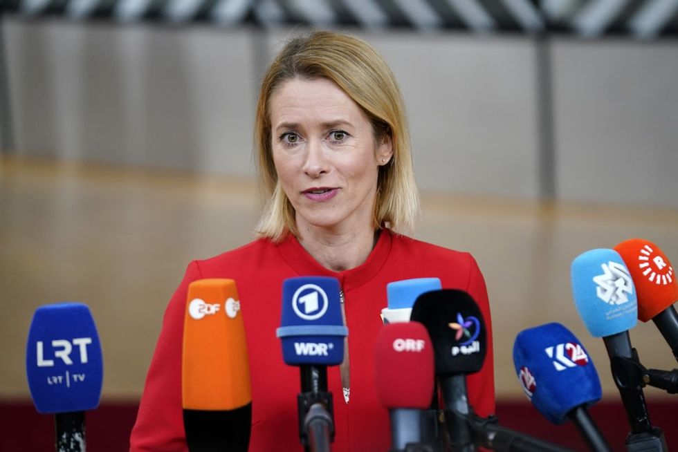 \u200bEstonia's Prime Minister Kaja Kallas talks with media at press corner of EU Leaders Summit on October 27, 2023