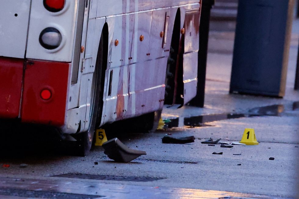 \u200bEvidence markers sit next to the double-decker