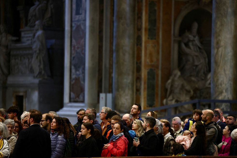 \u200bFaithful queue at St. Peter's Square to pay respect, as Pope Francis lies in state