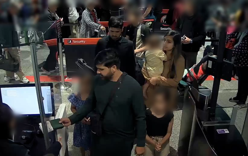 \u200bFamily leaving Heathrow airport