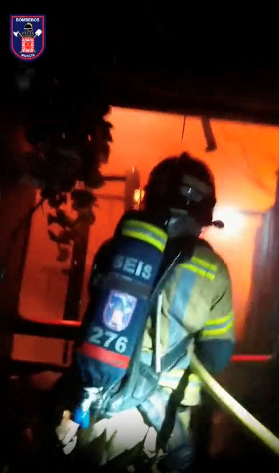 \u200bFirefighter tackling the blaze