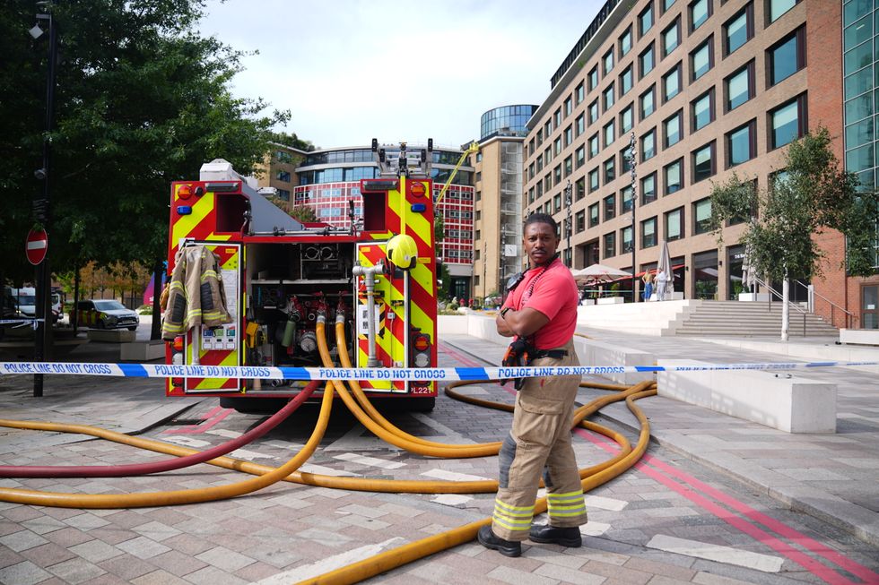 \u200bFirefighters remain at work at the scene