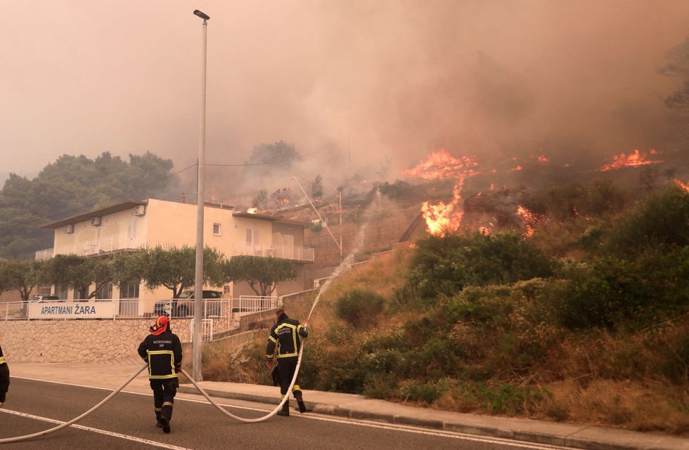 \u200bFirefighters try to extinguish the wildfire in Pisak, Croatia