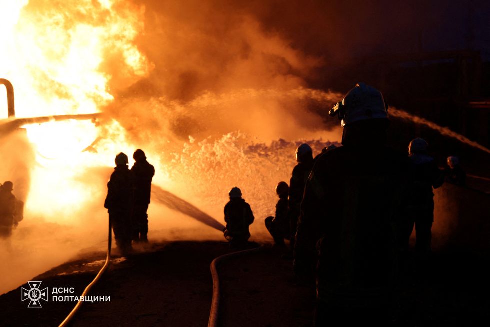 \u200bFirefighters work at the site of a Russian drone and missile strike, amid Russia's attack on Ukraine, in the Poltava region