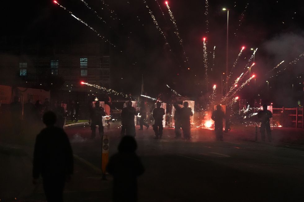 \u200bFireworks were thrown at police