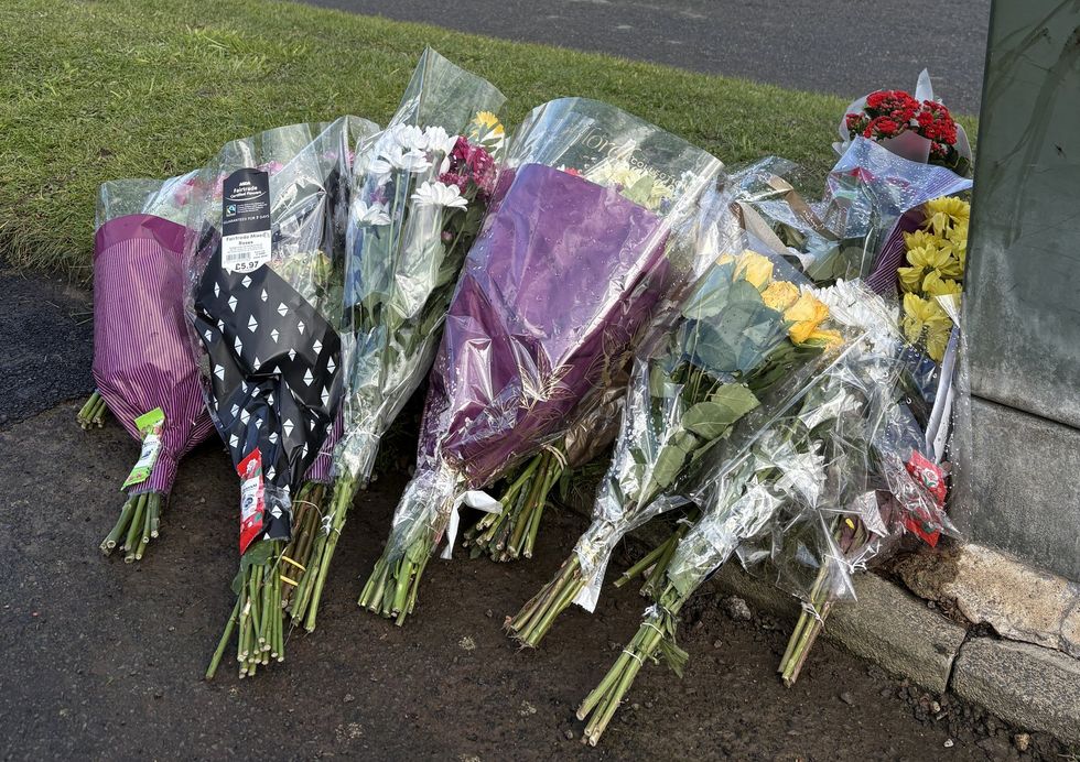 \u200bFloral tributes left at the scene in Leeds