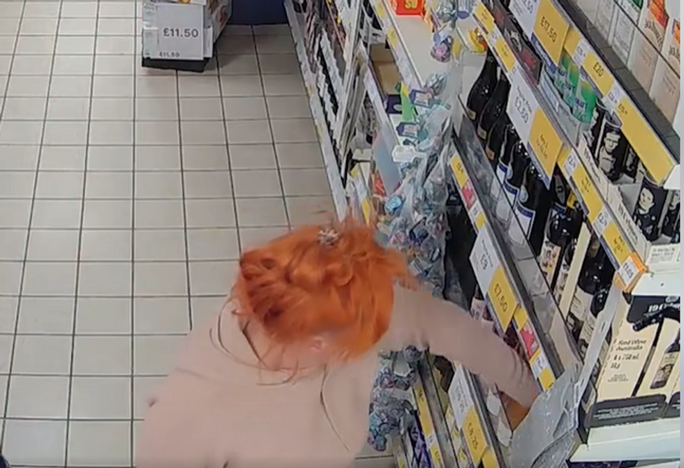 \u200bFootage shows Dodsworth picking up the prosecco