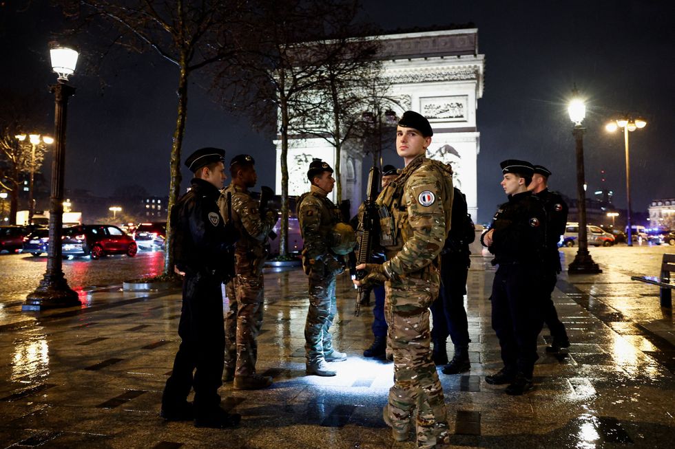 \u200bFrench police locked down the scene following the terror attack