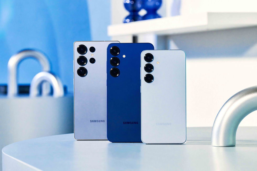 \u200bGalaxy S25 Ultra, Galaxy S25 Plus, and Galaxy S25 pictured stacked on a metal surface