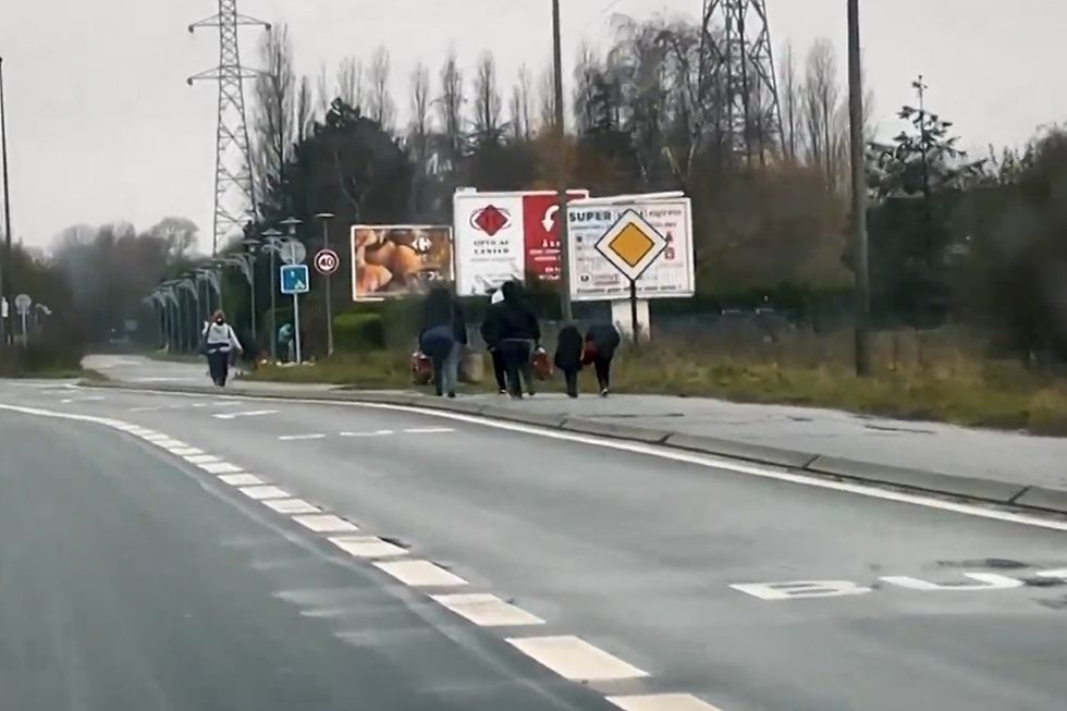 \u200bGB News filmed as migrants waited near road junctions and roundabouts