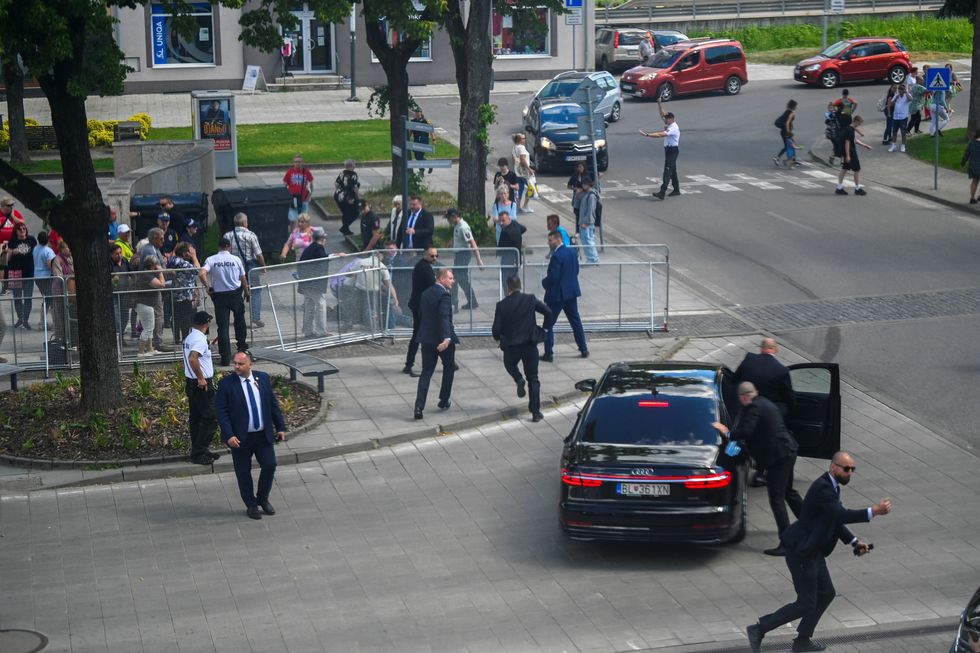 \u200bGovernment officials at the scene in Handlova
