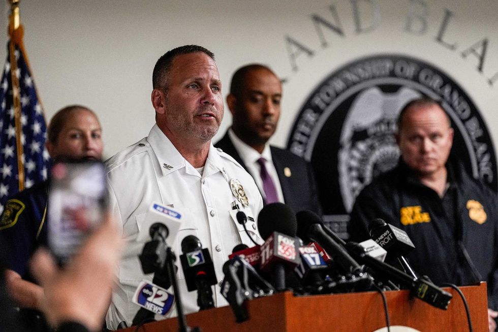 \u200bGrand Blanc Township police chief William Renye speaks during a press conference