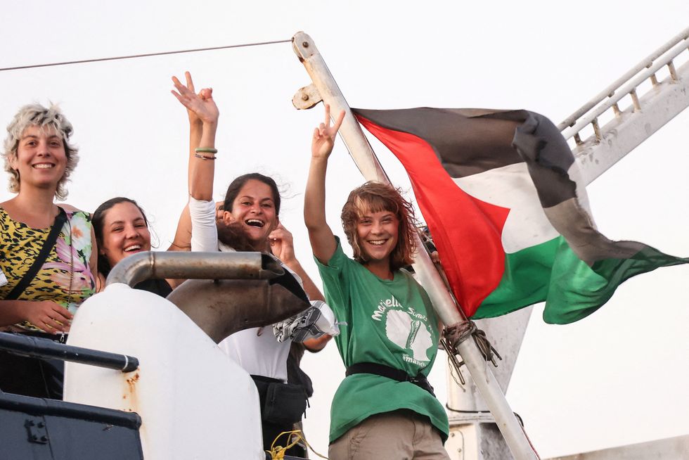 \u200bGreta Thunberg waves off the ship as it passes Crete