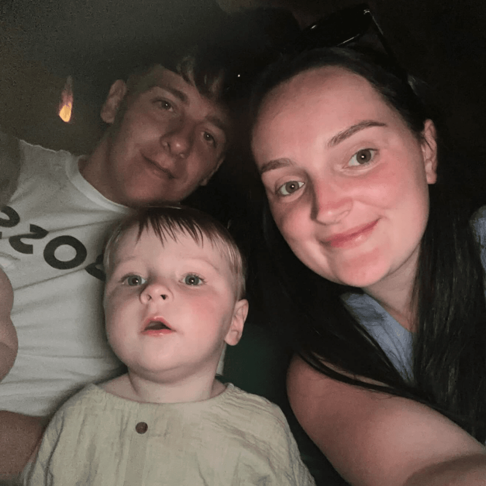 \u200bHarley Passmore and Millie Radford with their youngest child