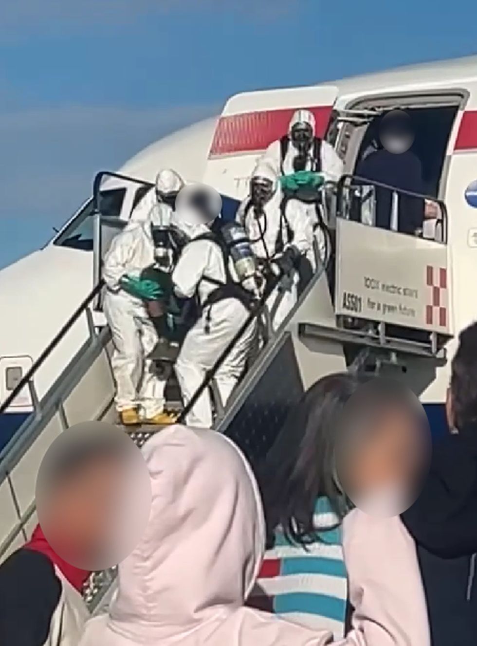 \u200bHazmat crews boarded the plane once it touched down in Italy