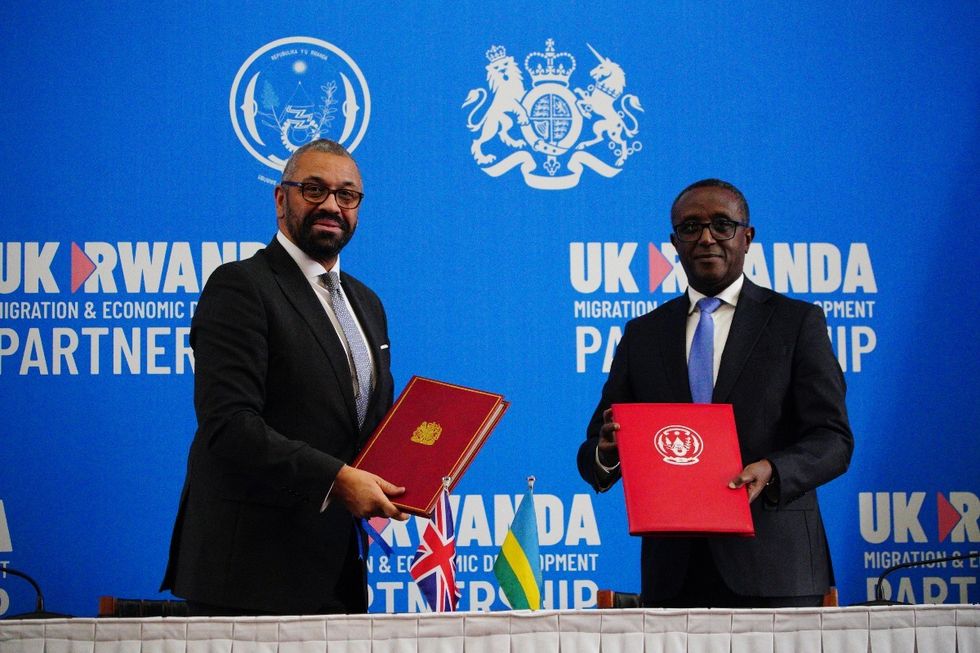 \u200bHome Secretary James Cleverly and Rwandan Minister of Foreign Affairs Vincent Biruta sign a new treaty