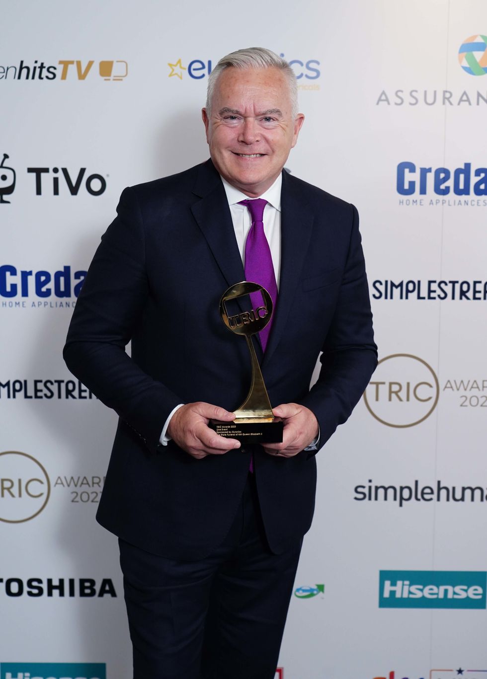 \u200bHuw Edwards with the Live Event award for the State Funeral of Queen Elizabeth II at the TRIC (The Television and Radio Industries Club) awards at the Grosvenor House Hotel in London on June 27, 2023.