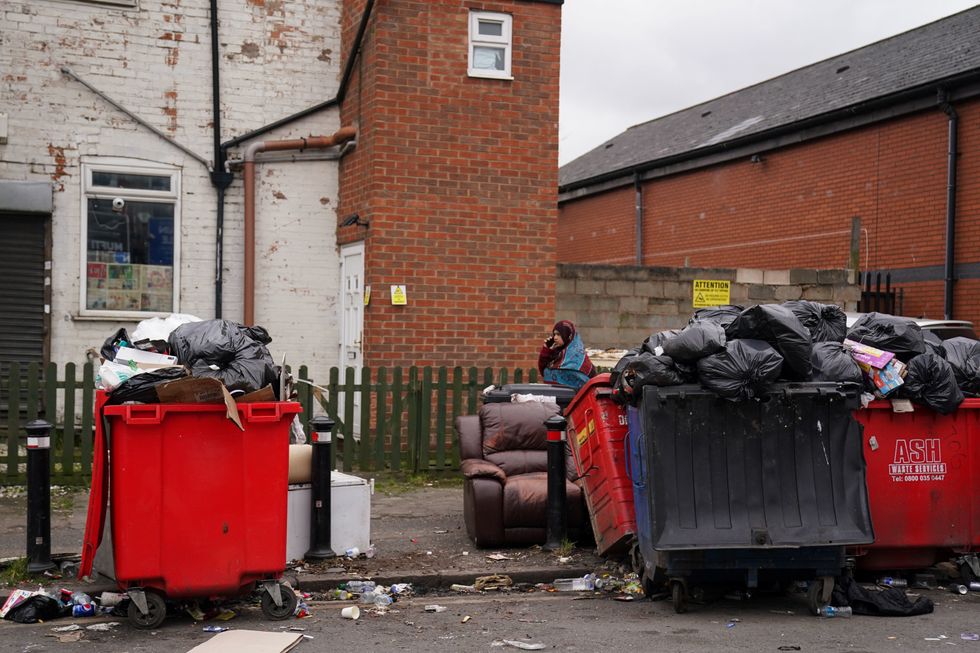 \u200bIndustrial action has left mountains of waste piled high across the streets