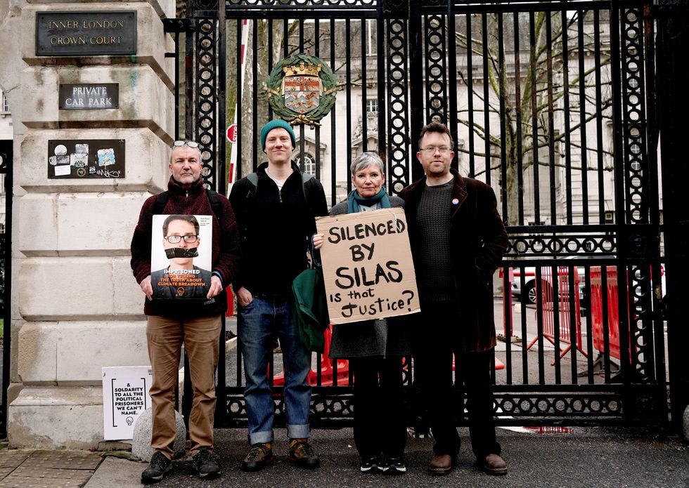 \u200bInsulate Britain campaigners, (left to right) Stephen Pritchard, Roman Paluch-Machnik, Ruth Cook and Oliver Rock, outside Inner London Crown Court
