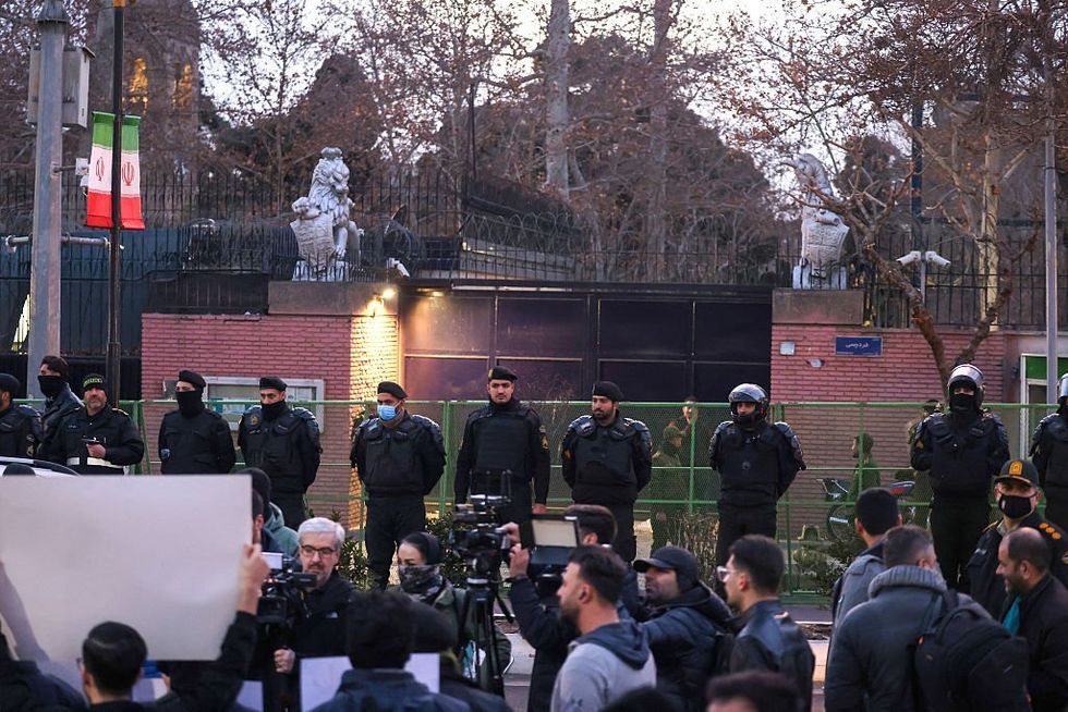 \u200bIranian police stand guard in front of the British Embassy in Tehran