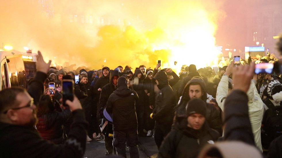 \u200bIsraeli Maccabi Tel Aviv supporters demonstrate and light flares in Amsterdam, Netherlands