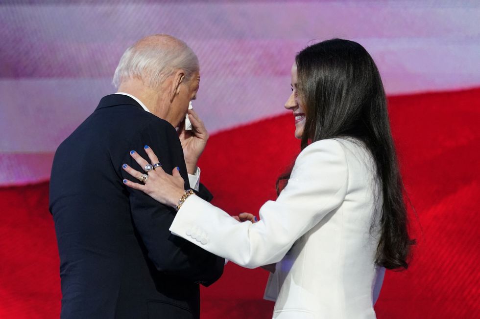 \u200bJoe Biden was comforted on stage by his daughter Ashley