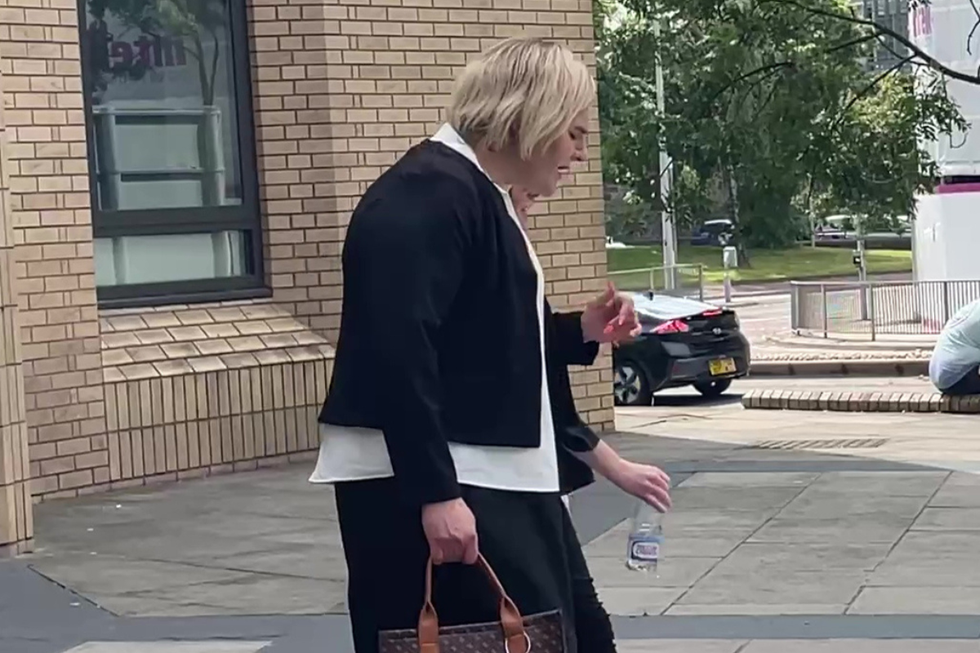 \u200bKatie Wallis leaving the Cardiff court